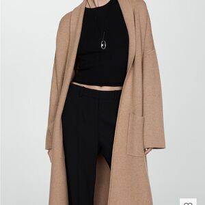 Oversized knitted coat with pockets
